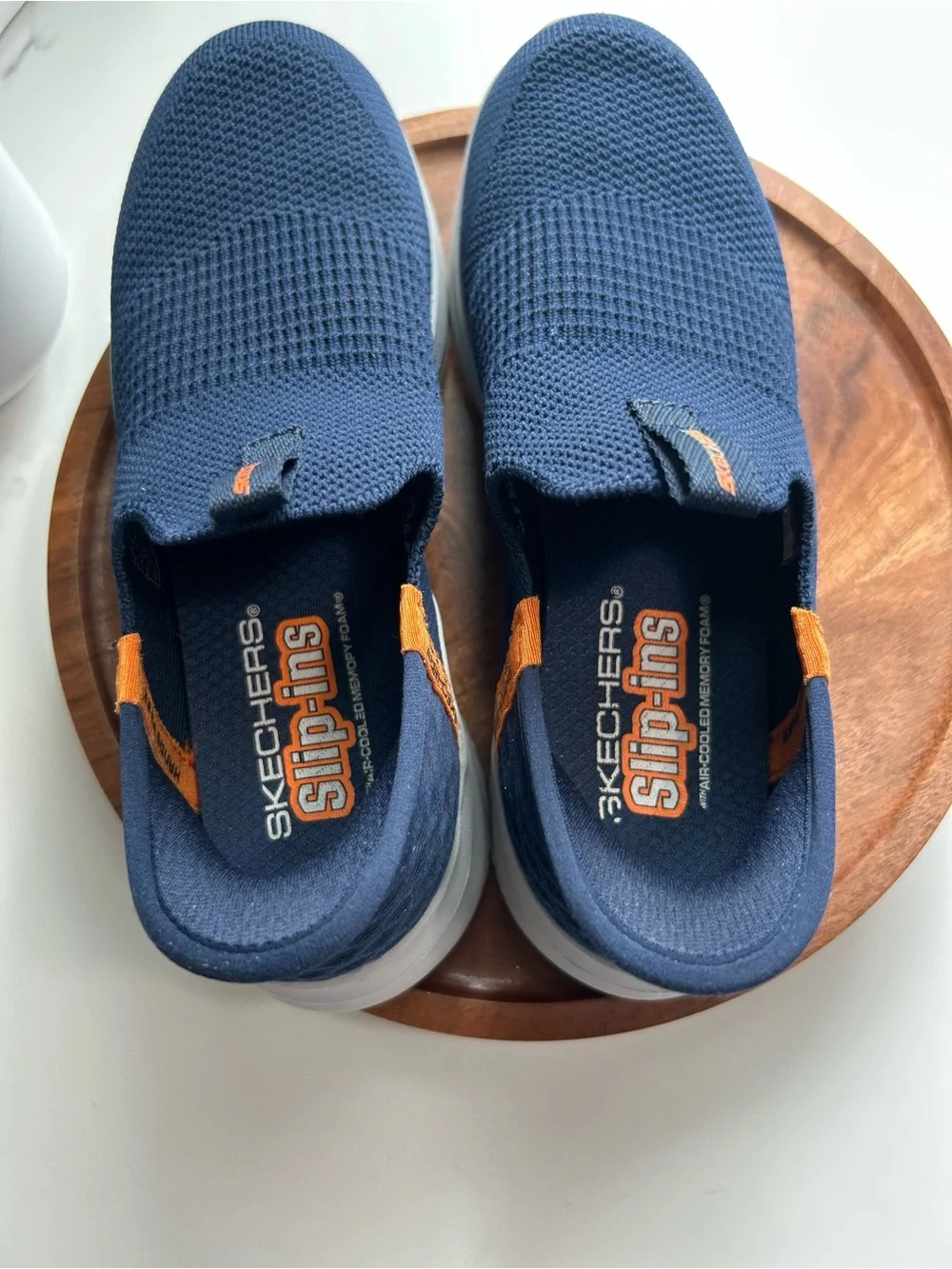 Skechers Kids Navy Slip-On Knit Sneakers with Orange Tabs